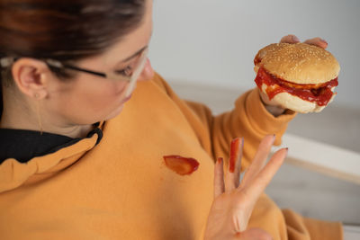 Close-up of woman holding ice cream