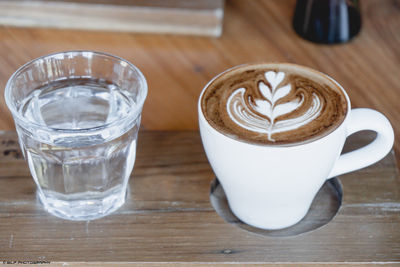 Close-up of coffee cup on table