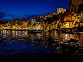 Illuminated buildings in city at night