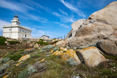 Rock formations on mountain against sky