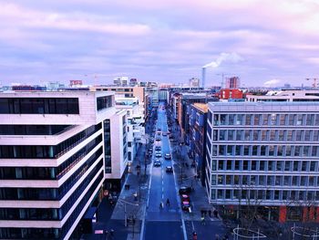 High angle view of city buildings against sky