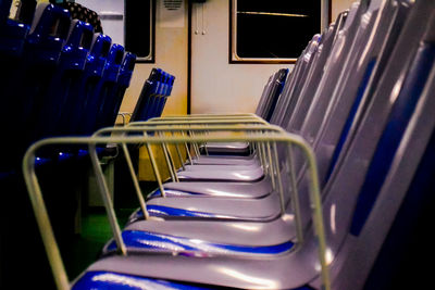 Close-up of empty seats in rack