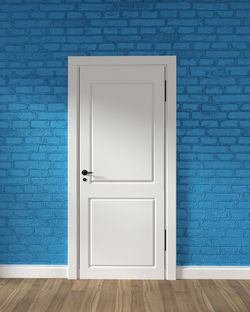 Open door on blue wall