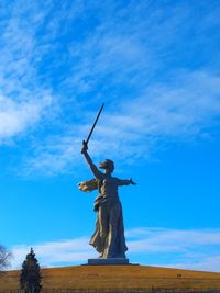 Low angle view of statue against sky