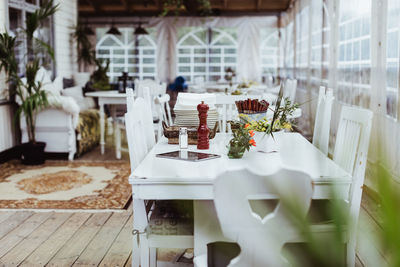 Empty chair and tables in restaurant