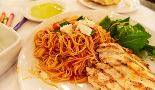 Close-up of noodles served in bowl on table