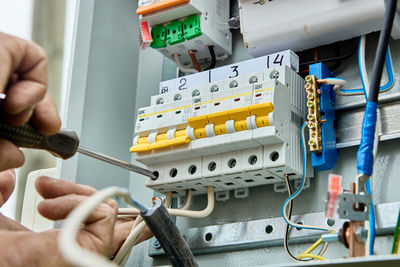 Midsection of man working on table