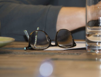 Close-up of sunglasses on table