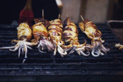 Close-up of meat on barbecue grill