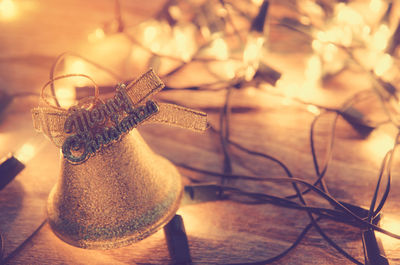 Close-up of illuminated christmas lights on table