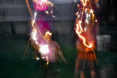 Close-up of fire in dark room