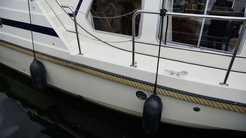 High angle view of boats moored in water