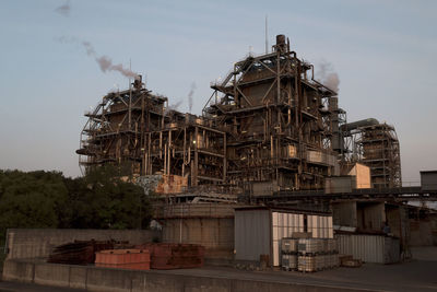 View of factory against sky