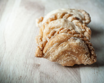 High angle close-up of sweet food on wooden table