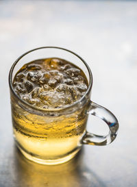 High angle view of beer in glass on table