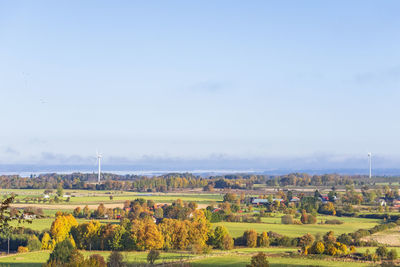 Countryside landscape view with farms and fields at autumn