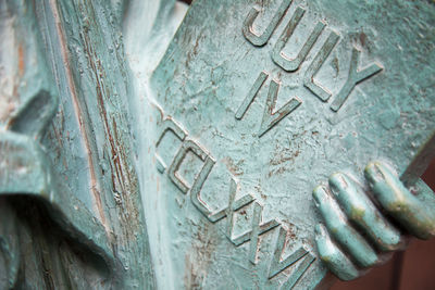 Close-up of text on statue