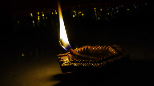 Close-up of illuminated candles