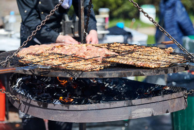 Meat cooking on barbecue grill