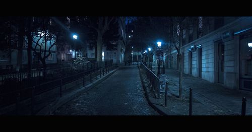 Illuminated street light at night