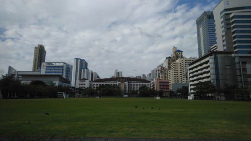 Buildings in city against sky