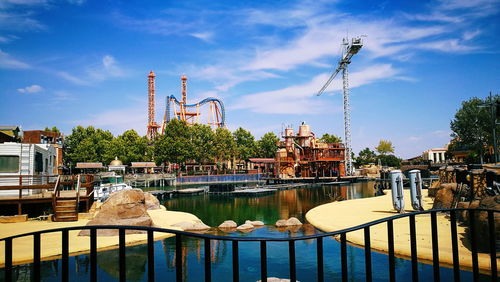 Gazebo in city against sky