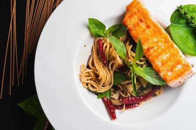 High angle view of vegetables in plate on table