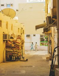 Woman standing in front of building