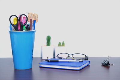 Close-up of glasses on table