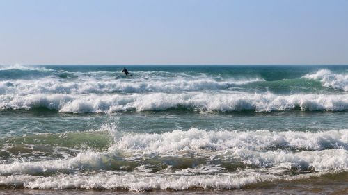 Scenic view of sea against clear sky