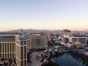 High angle view of buildings against clear sky during sunset