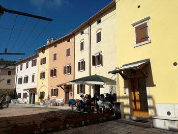 People in front of building