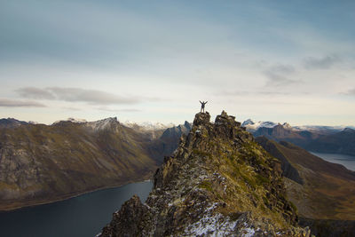 Man on top of a mountain in norway