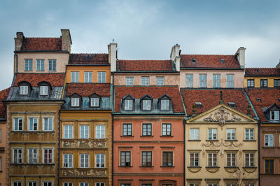 Low angle view of old buildings against sky