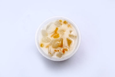 High angle view of ice cream over white background