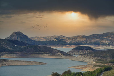 Scenic view of mountains against sky during sunset