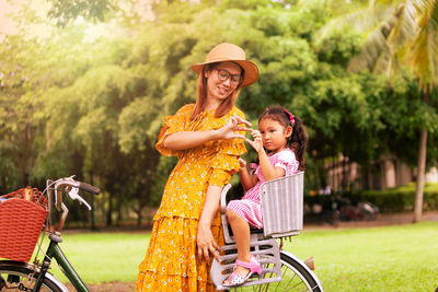 Happy girl riding bicycle