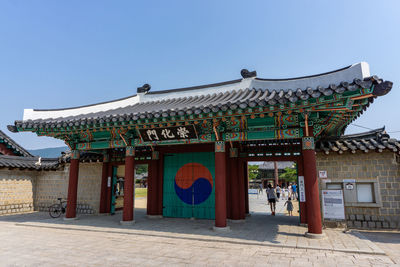 Entrance of temple against clear sky