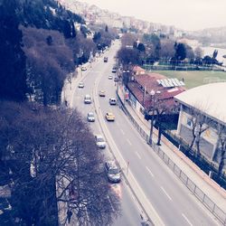 High angle view of cars on street in city