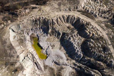 Abandoned industrial mining area. drone view of opencast mine filled with water. aerial shot