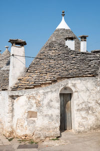 Low angle view of old building against sky