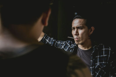 Portrait of young man looking at camera