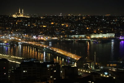 Illuminated city lit up at night