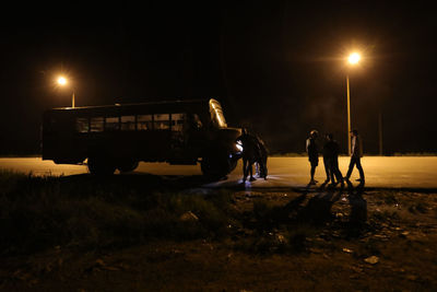 People on street at night