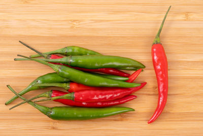 High angle view of chili peppers on table