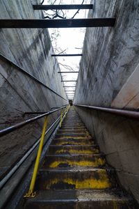 Low angle view of staircase in tunnel