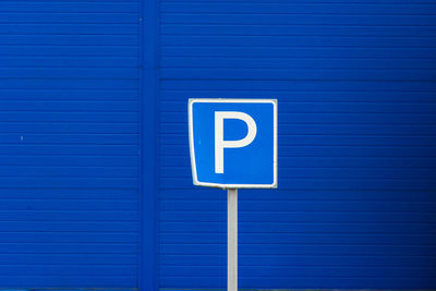 Parking allowed sign on blue background