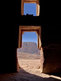 View of historical building through window