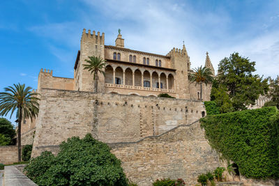 Low angle view of old ruins against sky