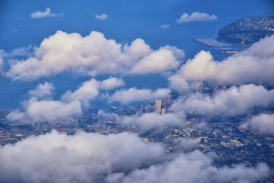 Seattle oregon aerial views from airplane. cloud cover, sea ocean and city views.